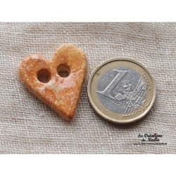 Bouton coeur vanille en céramique