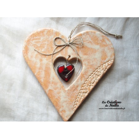 Coeur Hansi vanille en céramique à accrocher