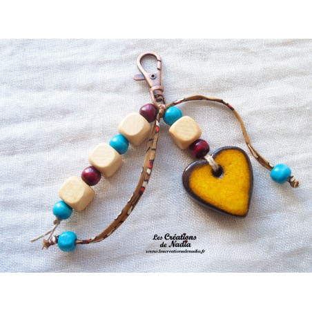 Grigri bijoux de sac, porte clés coeur jaune bouton d'or Grigri bijoux de sac, porte clés coeur jaune bouton d'or