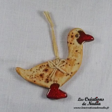 Petit canard en céramique, couleur pain d'épice, à suspendre