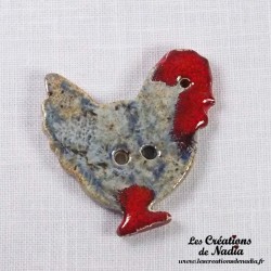 Bouton poule bleu-gris marbré en céramique