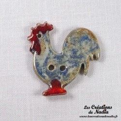 Bouton coq bleu-gris marbré en céramique