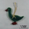 Petit canard en céramique, couleur vert bouteille, à suspendre