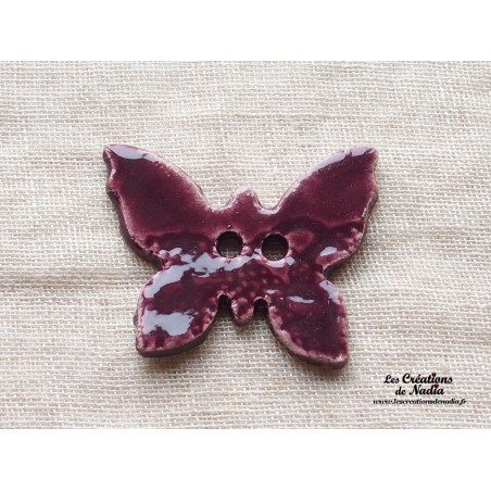 Bouton papillon couleur aubergine en céramique