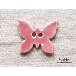Bouton papillon couleur rose en céramique