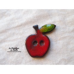 Bouton pomme rouge avec feuille en céramique