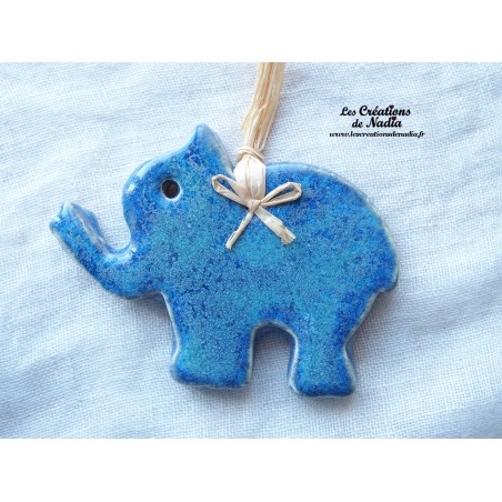 Petit éléphant couleur bleu turquoise en céramique Petit éléphant couleur bleu turquoise en céramique