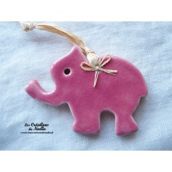 Petit éléphant couleur rose en céramique