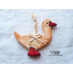 Petit canard en céramique, couleur pain d'épice, à suspendre