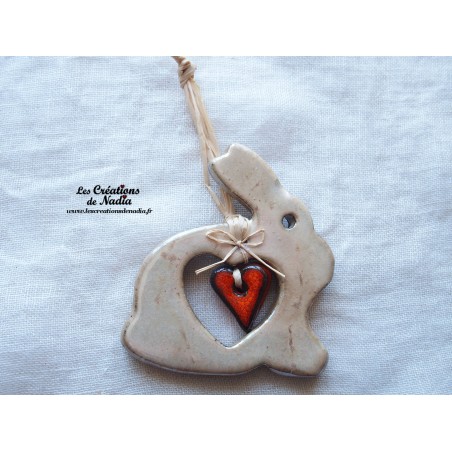 Lapin en céramique couleur marron glacé, à suspendre Lapin en céramique couleur marron glacé, à suspendre