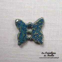 Bouton papillon bleu en céramique