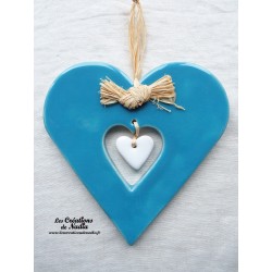 Coeur Hansi bleu lagon en poterie à suspendre