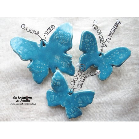 Lot de trois papillons en céramique pour les jardins et jardinières, couleur bleu lagon Lot de trois papillons en céramique pour les jardins et jardinières, couleur bleu lagon