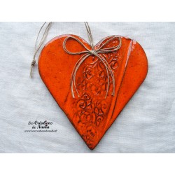 Coeur Hansi orange en céramique à suspendre