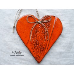 Coeur Hansi orange en céramique à suspendre