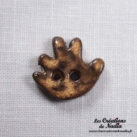Bouton petite main gauche en céramique, crème brûlée Bouton petite main gauche en céramique, crème brûlée