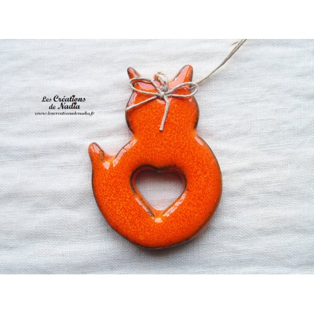Petit chat orange en céramique