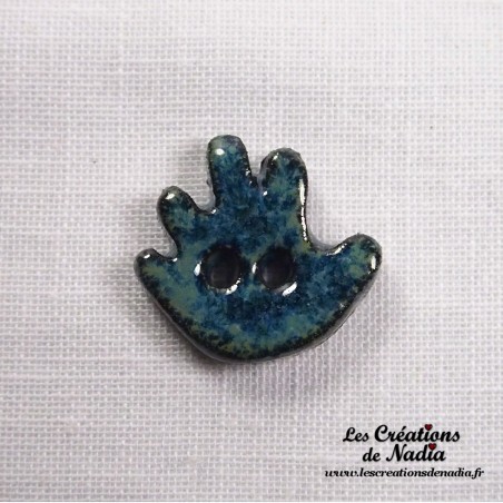 Bouton petite main gauche bleu en céramique Bouton petite main gauche bleu en céramique