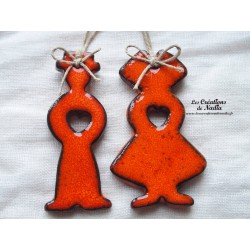 Petit couple d'Alsaciens en céramique, couleur orange