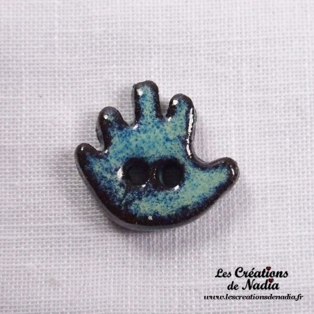 Bouton petite main gauche turquoise en céramique Bouton petite main gauche turquoise en céramique
