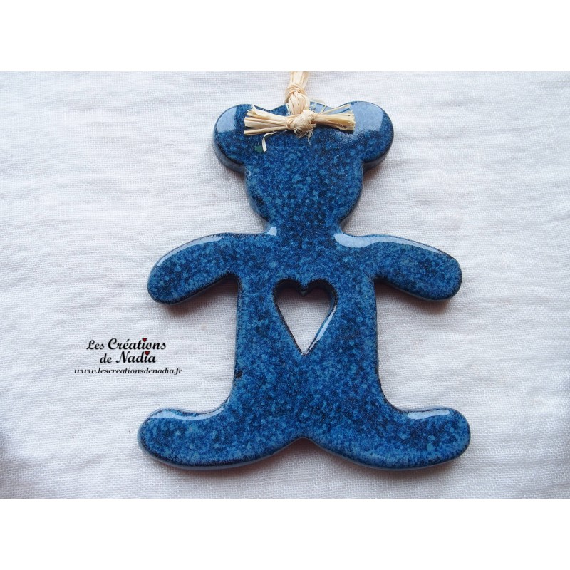 Grand ourson en céramique, couleur bleu, à suspendre