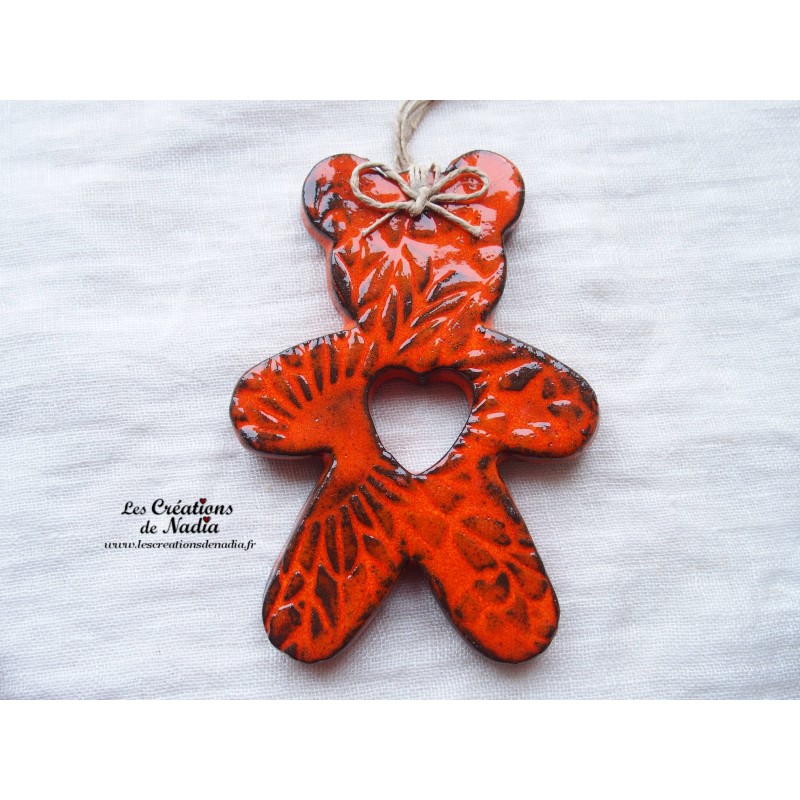 Ourson en céramique de couleur orange