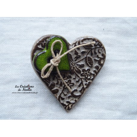 Broche coeur en céramique bicolore crème Broche coeur en céramique bicolore crème