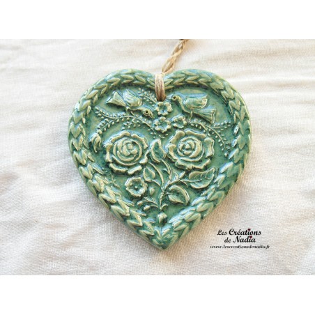 Coeur Springerlé couleur vert bouteille, impression oiseaux et fleurs Coeur Springerlé couleur vert bouteille, impression oiseaux et fleurs