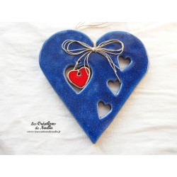 Coeur Hansi bleu outremer en poterie, à accrocher