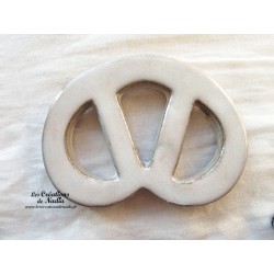 Bretzel dessous de plat en céramique vert émeraude