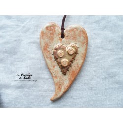 Coeur en céramique allongé couleur or et vanille, à suspendre