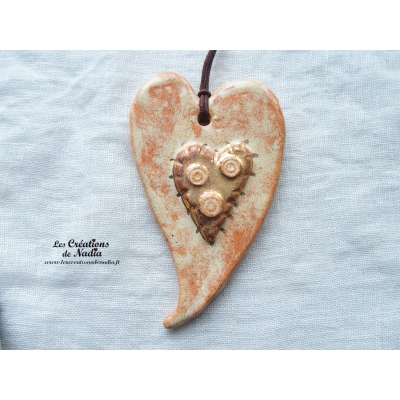 Coeur en céramique allongé couleur or et vanille, à suspendre