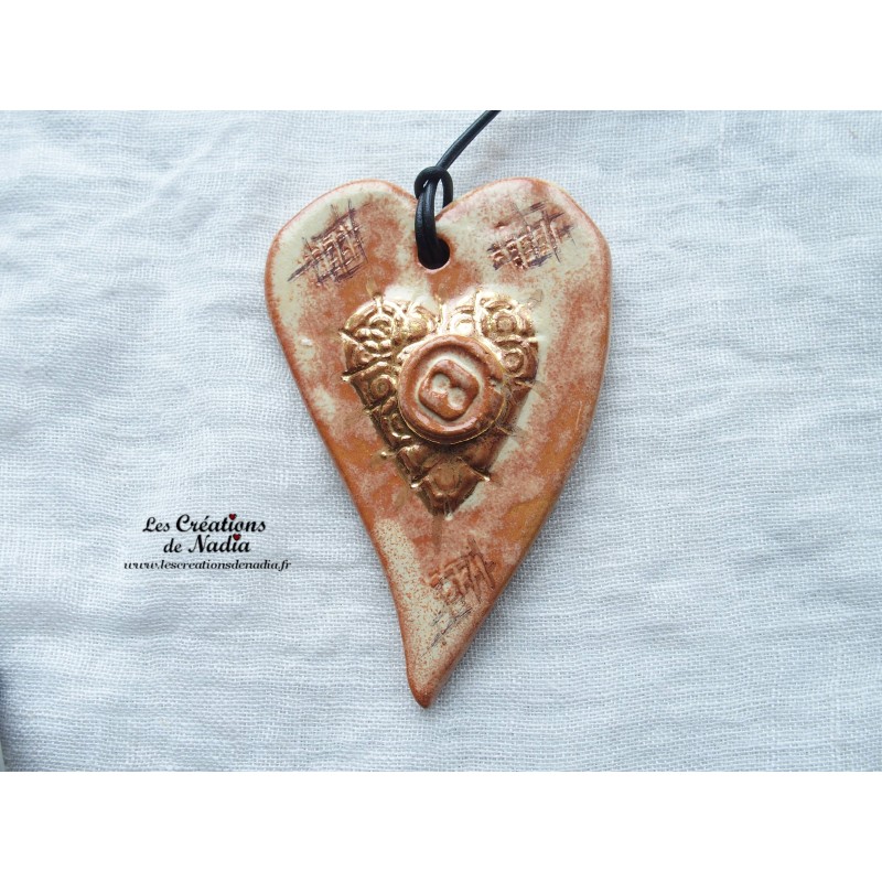 Coeur allongé en céramique couleur or et vanille, à suspendre